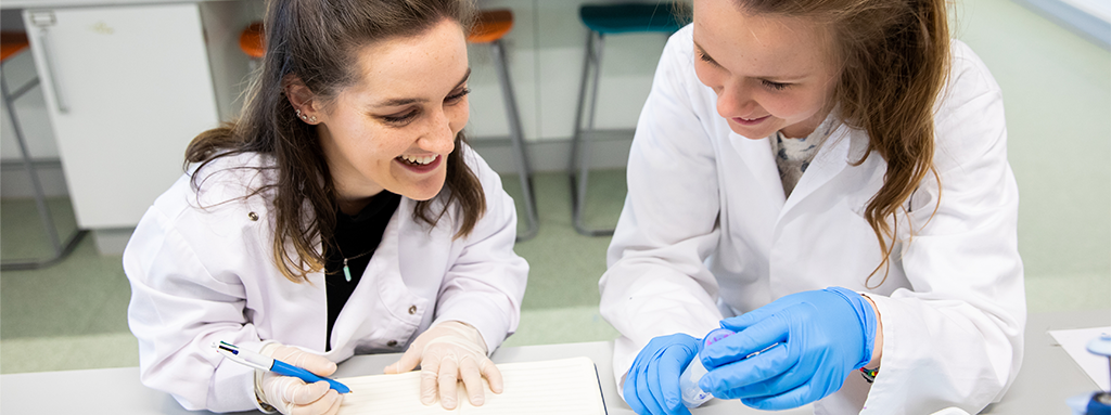 Staff and student in a UCD lab.